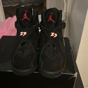 Black Air Jordan Sneakers with Red Accents